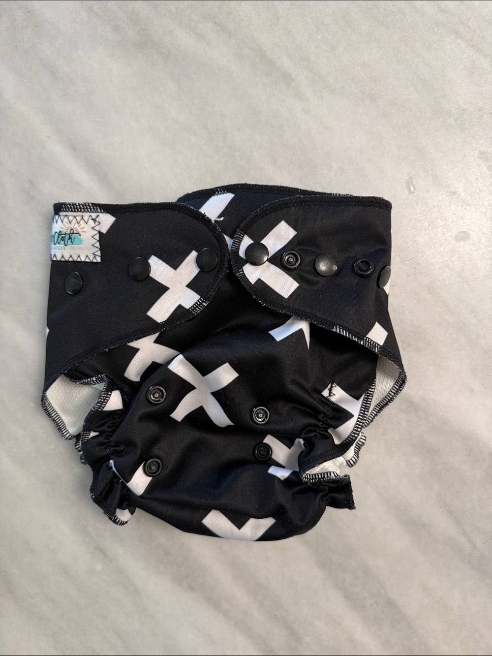 Adjustable Black Diaper Cover with White X Print